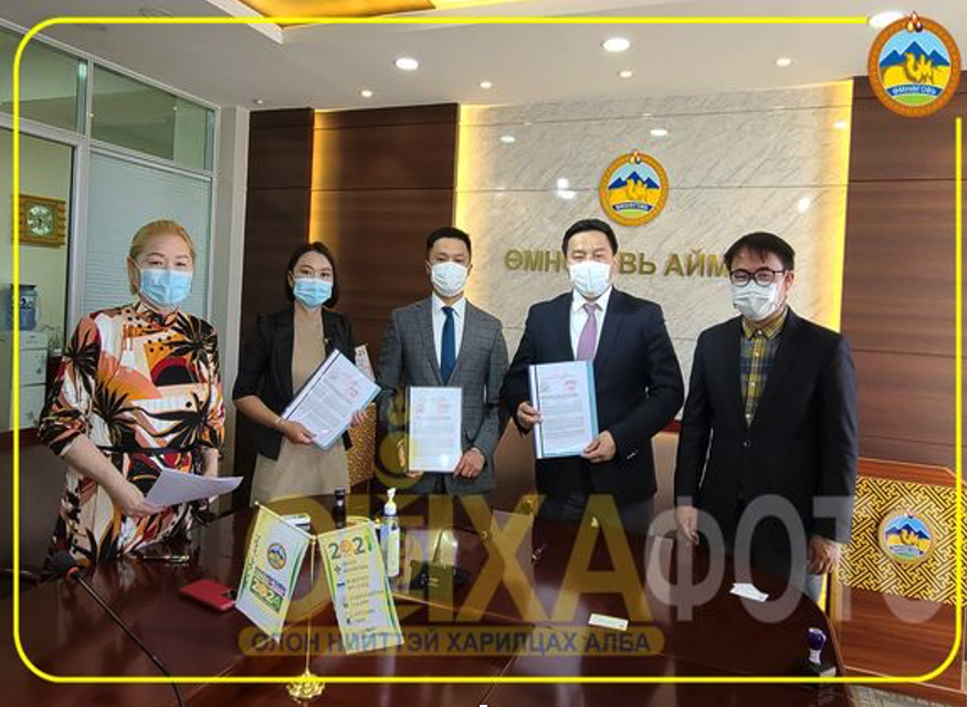 Picture Country Manager B.Achitsan signing cooperation agreement with Southgobi Provincial Governor in 2021